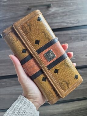 MCM Visetos Coated Canvas and Leather Trifold Wallet.